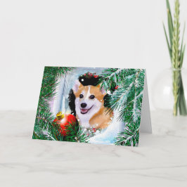 Lächeln walisischer Corgi im Winterfenster Feiertagskarte