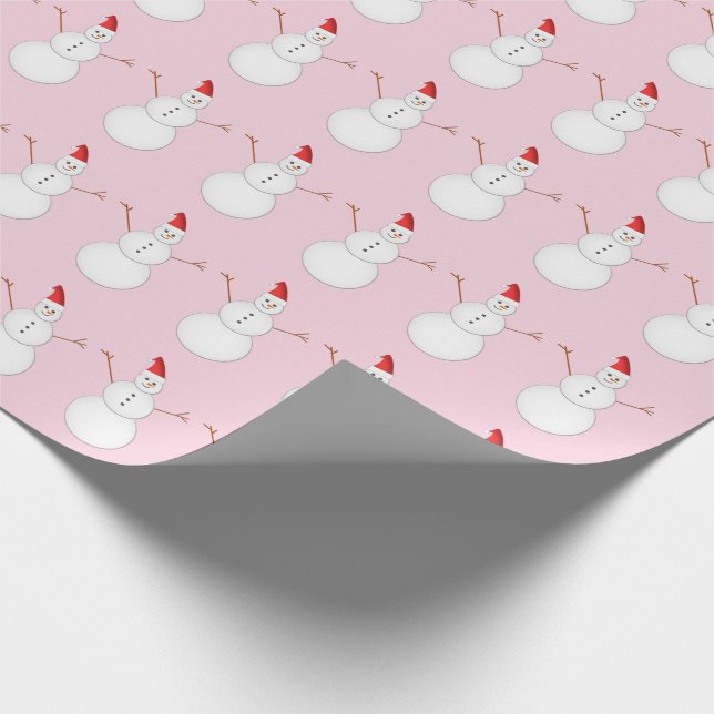 Lächelnde Snowmen, die Weihnachtsmannmützen tragen Geschenkpapier (Ecke)