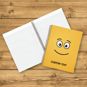 Lächelndes Gesicht mit offenen Augen Notizbuch