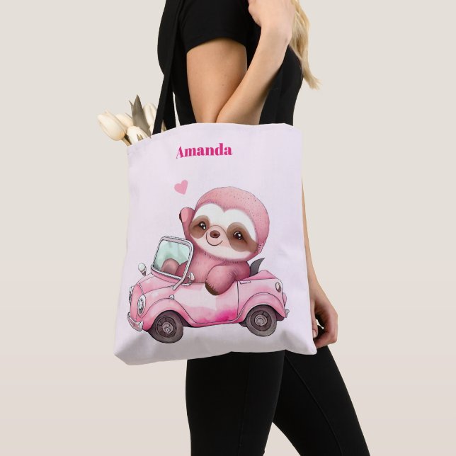 Lächelndes rosa Faultier, das ein Cabrio antreibt Tasche (Von Nahem)