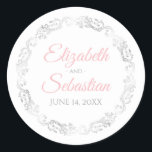 Lacy Silver Filigree Elegantes Rosa auf weißer Hoc Runder Aufkleber<br><div class="desc">Diese eleganten Hochzeitsaufkleber sind mit extravagantem rosa Schriftzeichen auf weißem Hintergrund mit einem silberfarbenen Imitat mit Blumenrahmen versehen. Der Text ist vollständig anpassbar und enthält die Namen des Ehepaares und das Hochzeitsdatum. Toll wie favorisierte Tags oder Umschlag Aufkleber!</div>