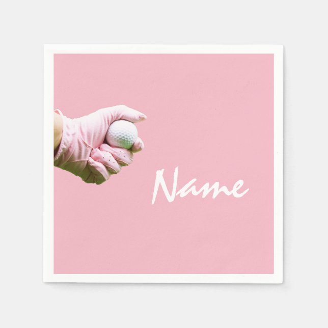 Lady Golfer hält Golfball auf rosa Golf Serviette (Vorderseite)