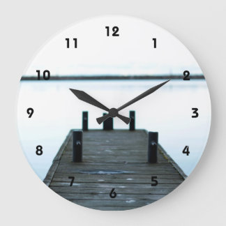 lake and deck . Kingston, Ontario, Canada Große Wanduhr