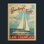 Lake Champlain Sailboat Vintage Travel Postkarte<br><div class="desc">Dieses Greetings From Lake Champlain Jahrgang Reise nautische Design verfügt über ein Boot,  das auf dem Wasser mit Möwen segeln und einen blauen Himmel gefüllt mit prächtigen puffigen weißen Wolken.</div>