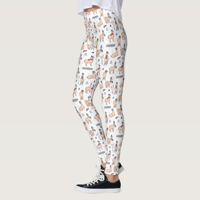 Lamas in Hut-u. Schal-Ski fahrendem Muster Leggings (Links)