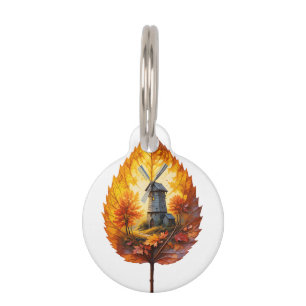 Ländliche Windmühle im Herbstglanz Haustiermarke