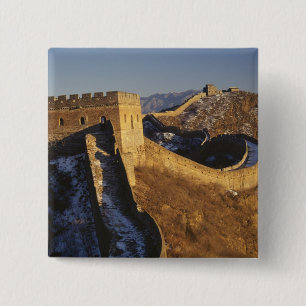 Landschaft der Großen Mauer unter Sonnenuntergang Button