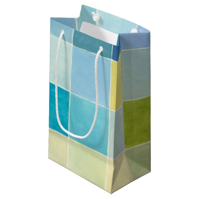 Landschaft mit mehrfarbigen, pixeligen Quadraten Kleine Geschenktüte (Vorderseite Schrägansicht)