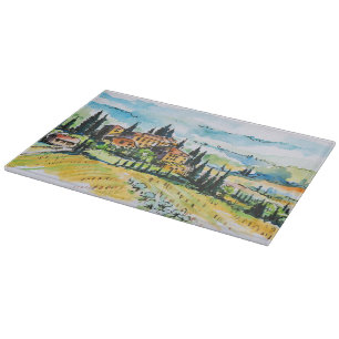 Landschaft mit Stadt- und Zypressenbäumen Schneidebrett