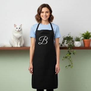 Lange massive schwarze monogrammierte Schürze