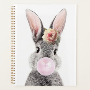 Lapin gris soufflant bulle gomme avec fleur d'aném
