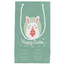 Lapin mignon avec le sac de cadeau de l'oeuf de
