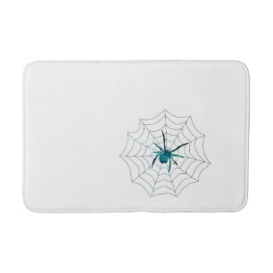 L'araignée sur un tapis de bain