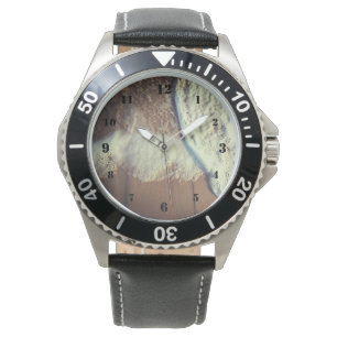 Lave-linge blanc sur la montre de plage