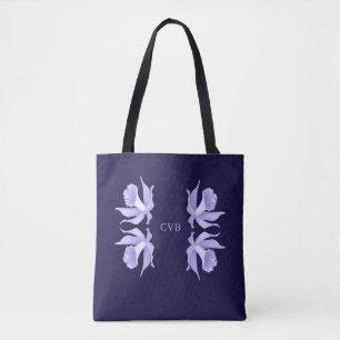 Lavendel zu den hellpurpurnen Orchideen auf Tasche