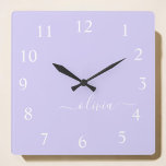 Lavender Purple Script Monogram Girly Name  Quadratische Wanduhr<br><div class="desc">Lavender Purple Script Monogram Name Clock. This makes the perfect sweet 16 birthday,  wedding,  bridal shower,  anniversary,  baby shower or bachelorette party gift for someone that loves glam luxury and chic styles.</div>