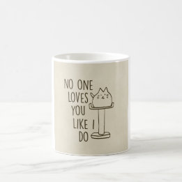 Le chat vous aime comme je fais la tasse en