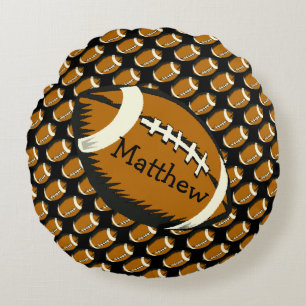 Le football folâtre le coussin rond de noir et de