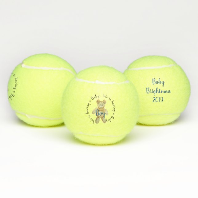 Le genre de garçon indiquent la balle de tennis (Multiple)
