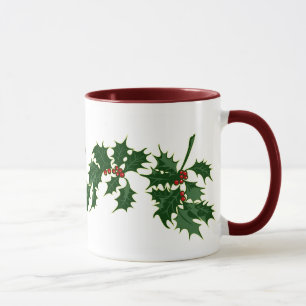 Le houx de Joyeux Noël laisse la tasse