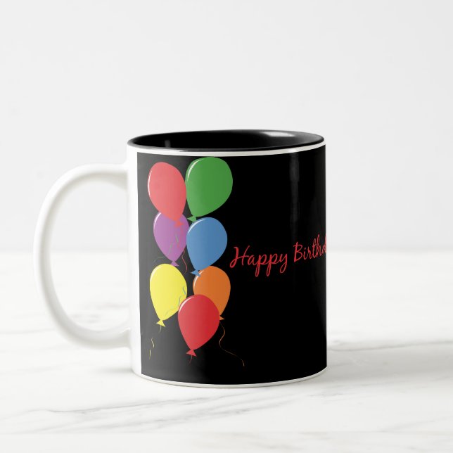 Le joyeux anniversaire monte en ballon la tasse de (Gauche)