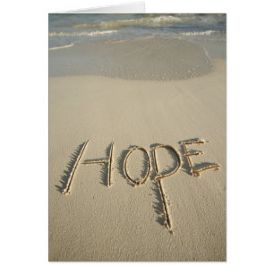 Le mot "Hope" sur la plage