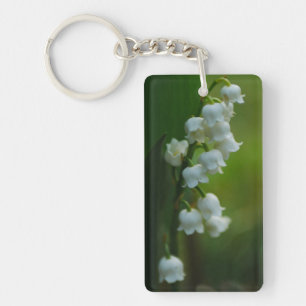 Le muguet fleurit le porte - clé