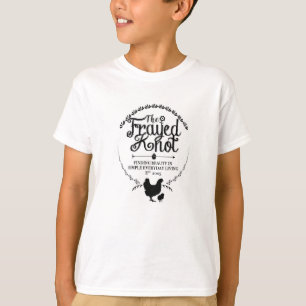Le noeud frangé - le logo badine le T-shirt