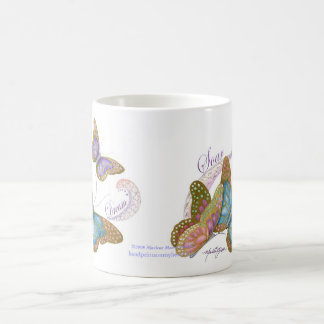 Le papillon rêve demi d'enveloppe de tasse