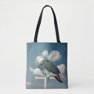 Le perroquet gris africain sur un sac fourre-tout