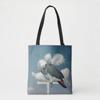 Le perroquet gris africain sur un sac fourre-tout