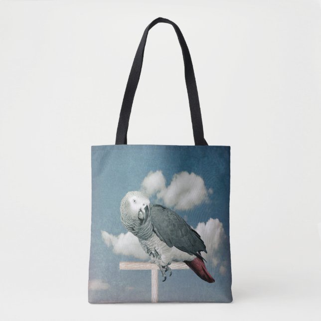 Le perroquet gris africain sur un sac fourre-tout (Devant)