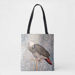 Le perroquet gris africain sur un sac fourre-tout