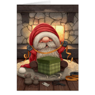 Le Petit Santa wrapping a gift