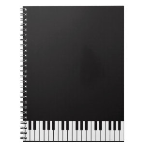 Le piano verrouille le carnet de notes à spirale