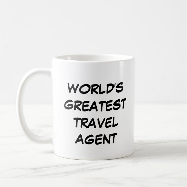 "Le plus grand agent de voyage du monde" Mug (Gauche)