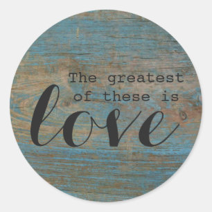 "Le plus grand est l'amour" Sticker rond en bois