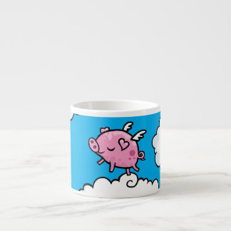 Le porc de vol danse sur la tasse de café express