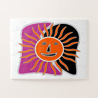 Le puzzle de la face souriante du soleil