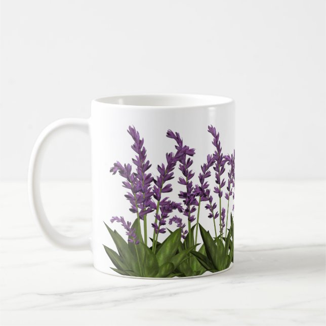 Le ressort pourpre de lavande fleurit la tasse de (Gauche)
