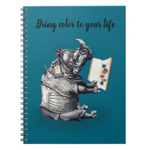 Le rhinocéros lecteur aime les livres