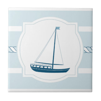 Le style nautique de voilier bleu barre le carreau