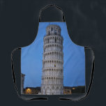 Leaning Tower at Dusk Schürze<br><div class="desc">This captivating photograph showcases the iconic Leaning Tower of Pisa standing elegantly against a deep blue twilight sky in Pisa. The historic marble tower, famous for its unmistakable tilt, is beautifully illuminated, highlighting its intricate Romanesque arches and layered columns. The soft evening light creates a striking contrast between the glowing...</div>