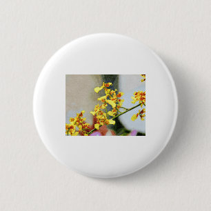 Lebendige gelbe Orchideen in einem Aquarell-Kunsts Button