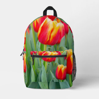 Lebendige rote und gelbe Tulpen im Frühlingsgarten Bedruckter Rucksack