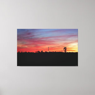 Lebendiger Sonnenuntergang über offenem Feld #2 Leinwanddruck