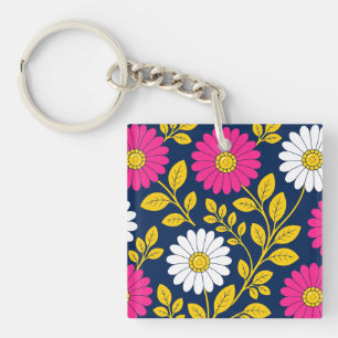 Lebendiges Blumendesign mit Gänseblümchen und gold Schlüsselanhänger