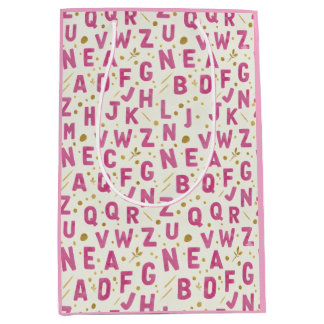 Lebendiges rosa Alphabet und goldenes Glittermuste Mittlere Geschenktüte
