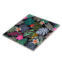 Lebendiges tropisches Blätter- und Blumenmuster
