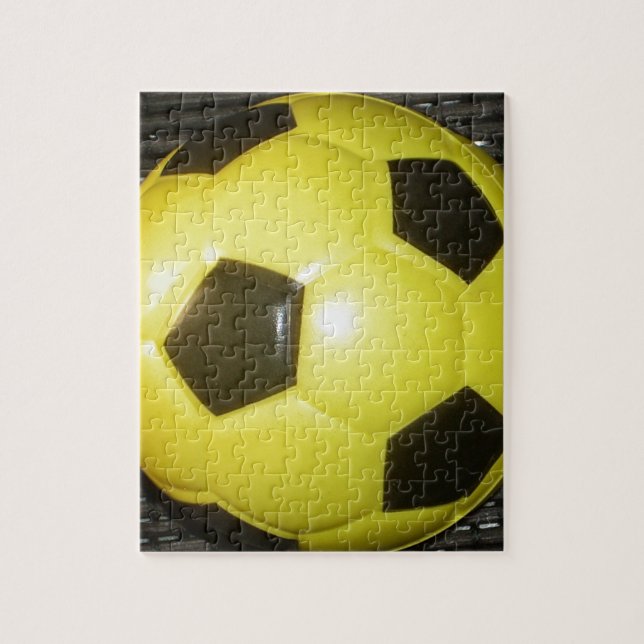 Lebhafte Gelb- und Schwarzfußballkunst (Vertikal)